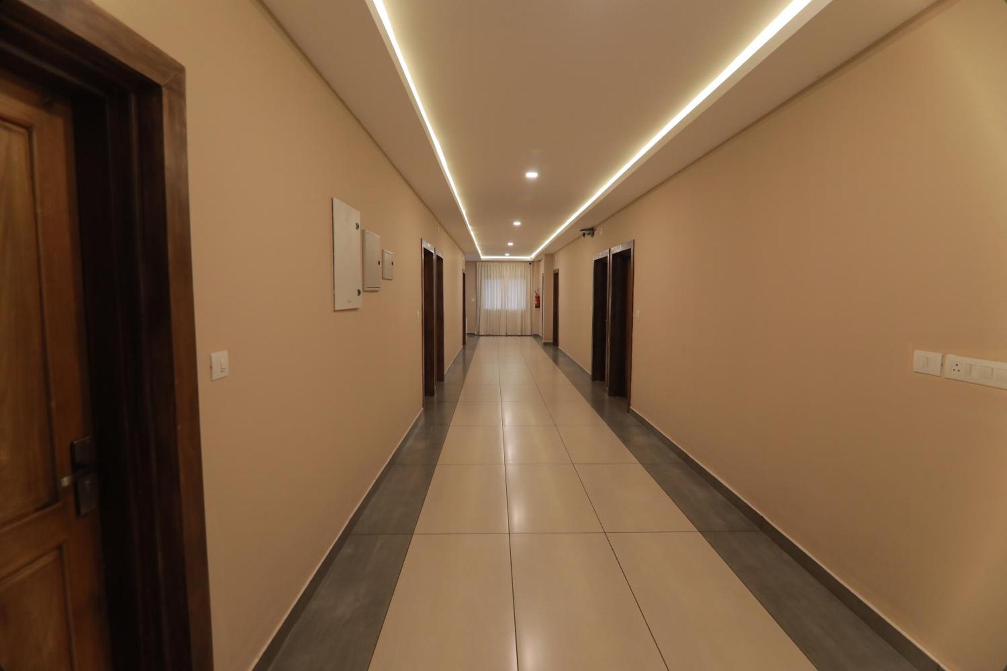 Opm Inn Payyannur Экстерьер фото
