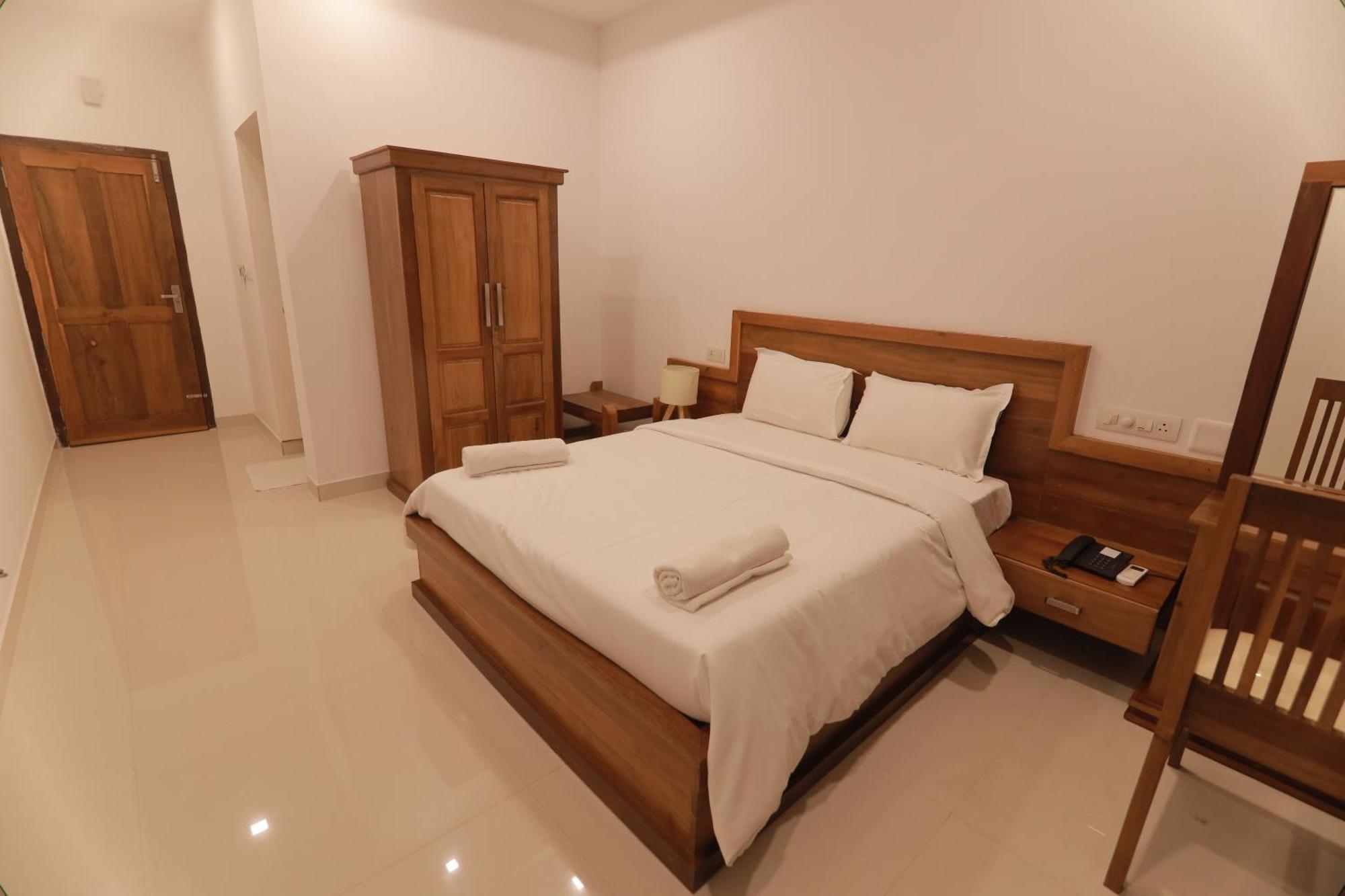 Opm Inn Payyannur Экстерьер фото