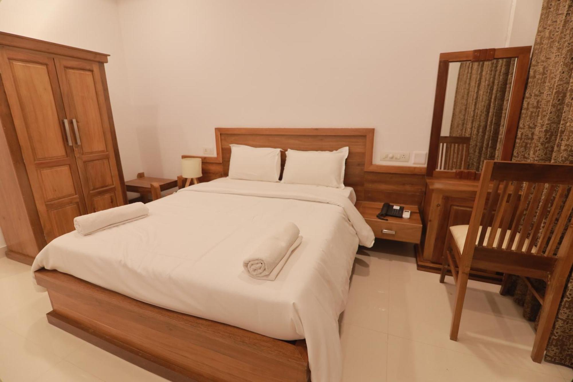 Opm Inn Payyannur Экстерьер фото